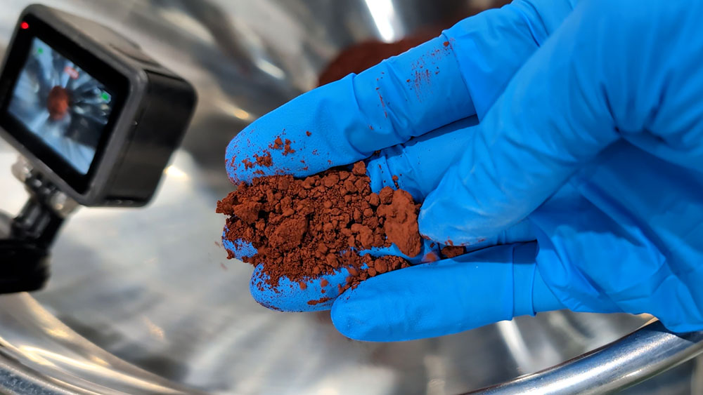 排出不良の原因となる大きな塊(凝集塊)が混じった状態の金属粉